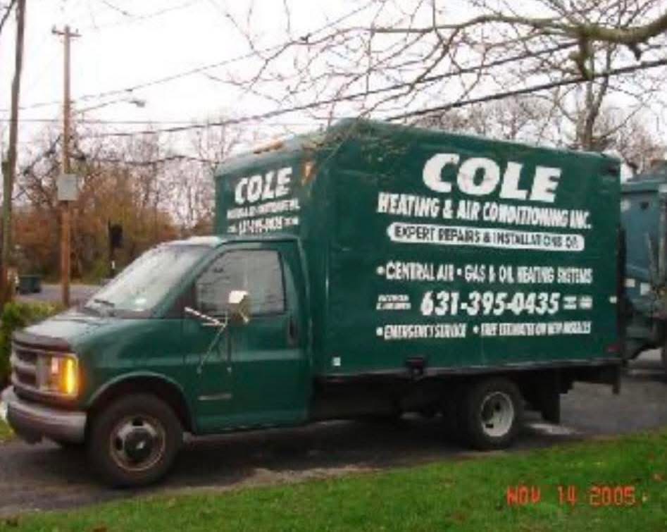 Older green Cole Heating and Air Conditioning truck